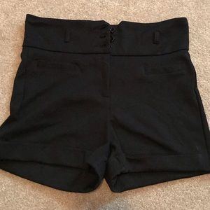 High waisted black shorts.